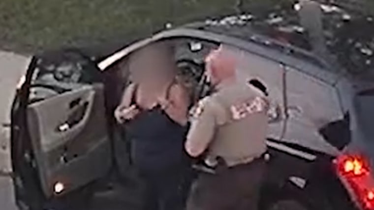 Woman choking while driving saved by officer