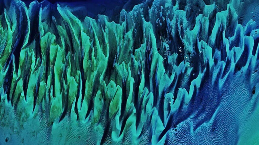 Colorful ‘painting-like’ ripples cover an ancient seafloor structure the Bahamas — Earth from space
